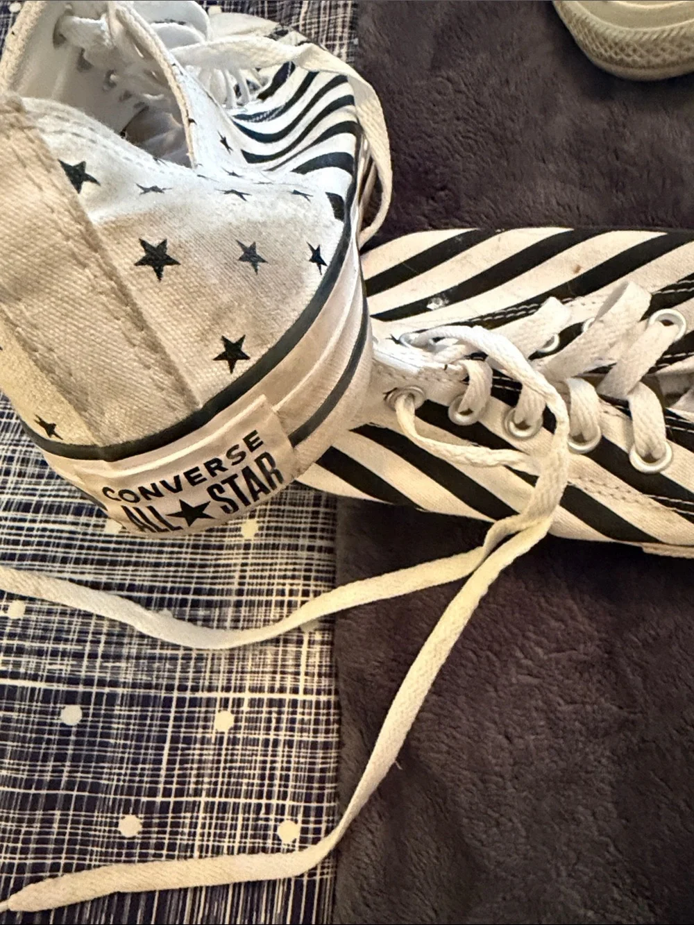 Converse White Canvas Sneakers with Black Diagonal Stripes and Star Accents